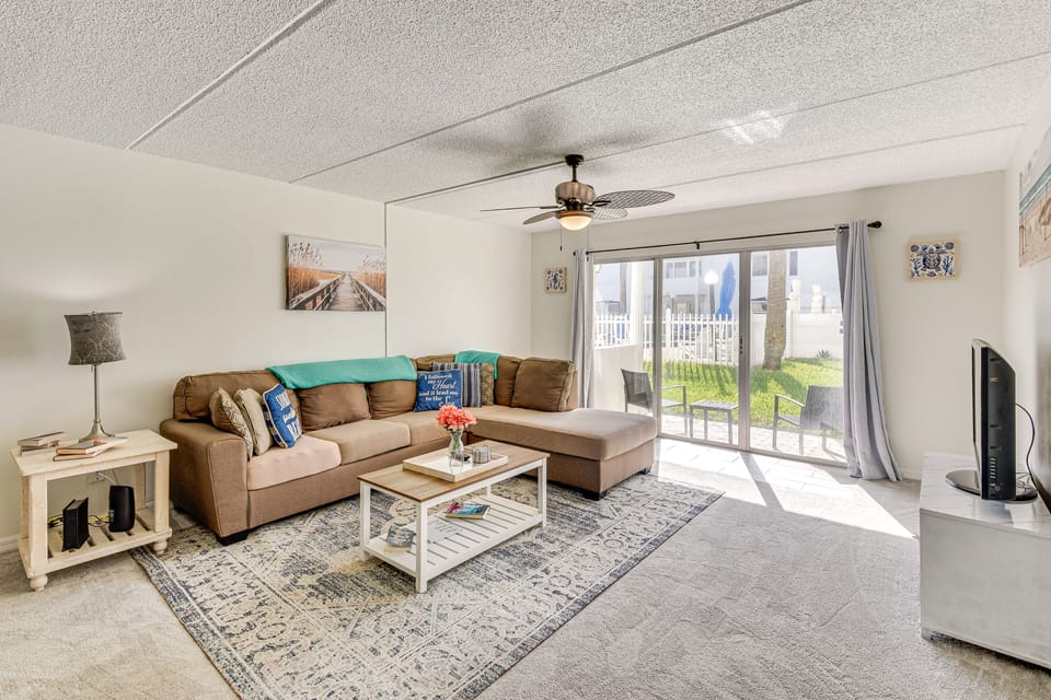 Coastal Condo Escape: Steps to Beach Apartment in Daytona Beach