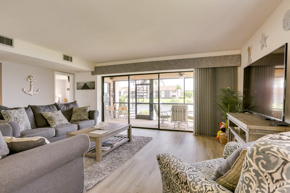 Covered Lanai & Waterfront View: Cape Coral Condo Apartment in Cape Coral