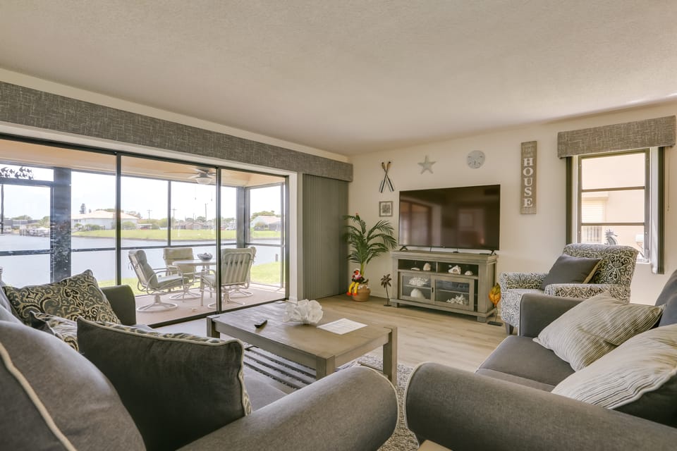 Covered Lanai & Waterfront View: Cape Coral Condo Apartment in Cape Coral