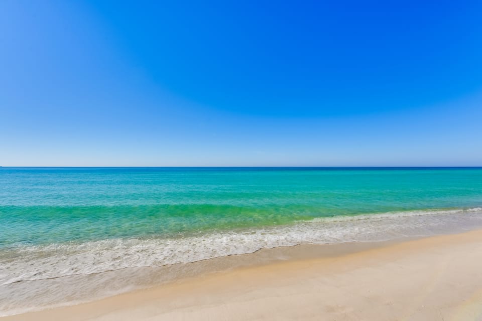 Steps to Shore: PCB Condo w/ Pool Access + Views! Apartment in Upper Grand Lagoon