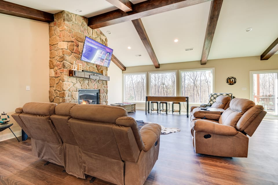 Home Gym & Fireplace: Roaring River Retreat House in North Carolina