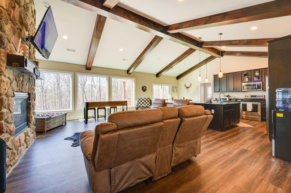 Home Gym & Fireplace: Roaring River Retreat House in North Carolina