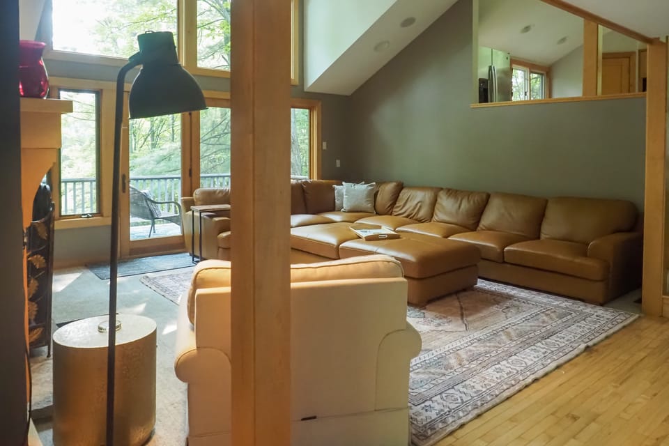 Nestled in the Woods, Walk to Town Suttons Bay House in Suttons Bay
