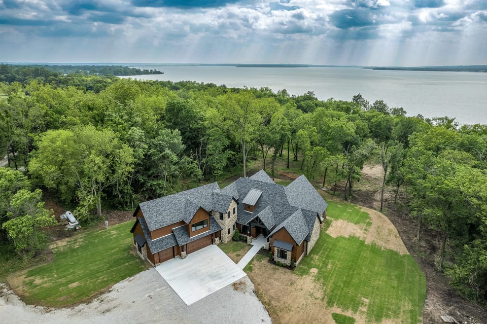 Game Room & Hot Tub! Lakefront Monkey Island Haven House in Ozark Mountains