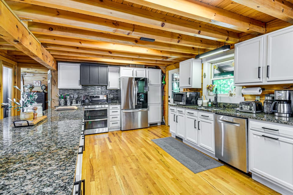 Hot Tub & Patio: Bedford Log Cabin on 10 Acres! House in West Virginia