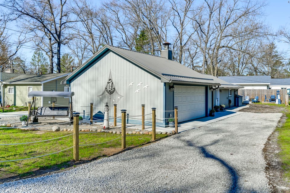 Walk to Sand Lake Beach! Family Escape w/ Fire Pit House in Michigan