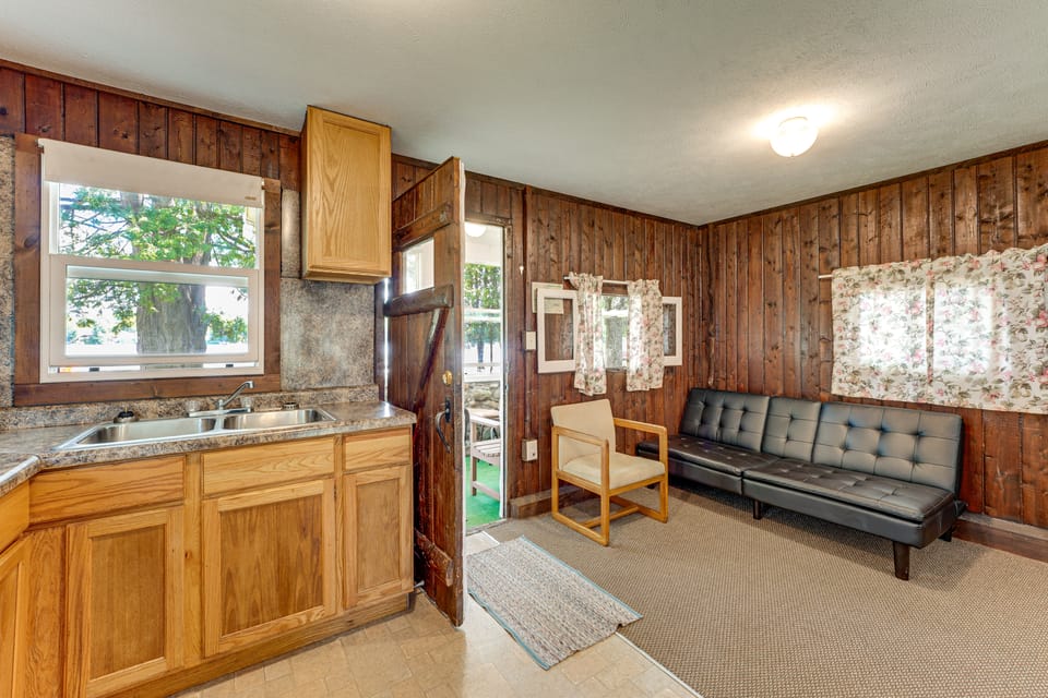 Pet-Friendly Bass Lake Cabin: Beach & Boat Dock House in Michigan