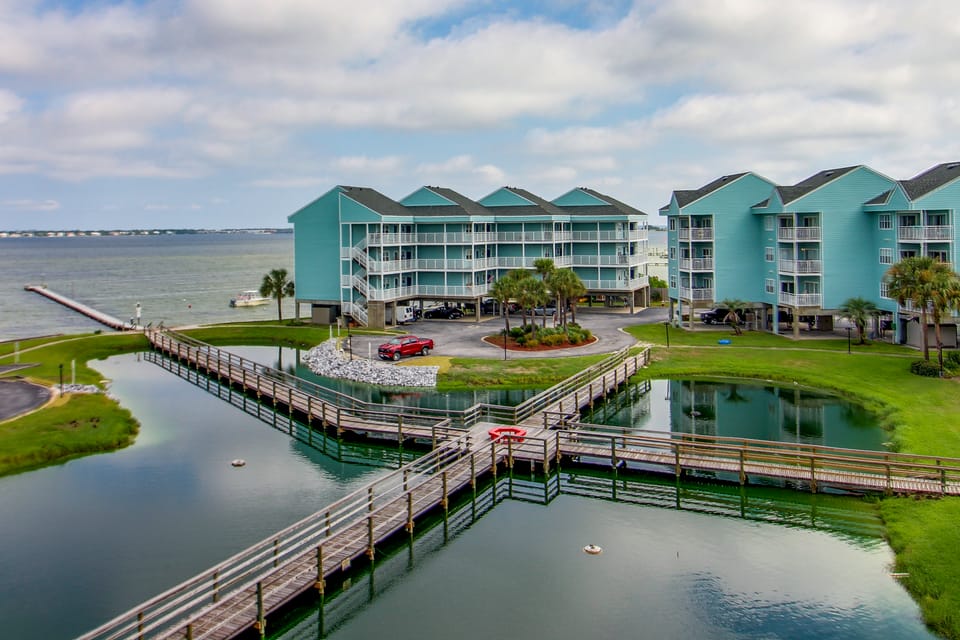 Unwind Poolside, Walk to Beach! Pensacola Getaway Apartment in Pensacola Beach