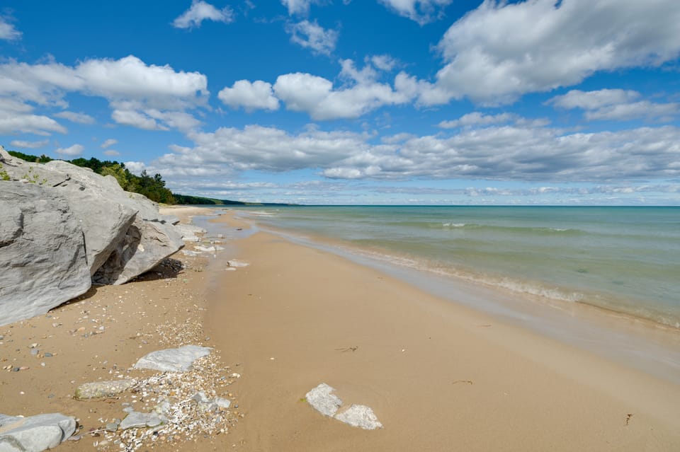 Lakefront Escape at Sunrise Side Resort Apartment in Michigan