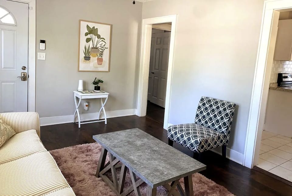 Another view of the living room, looking towards the front door.