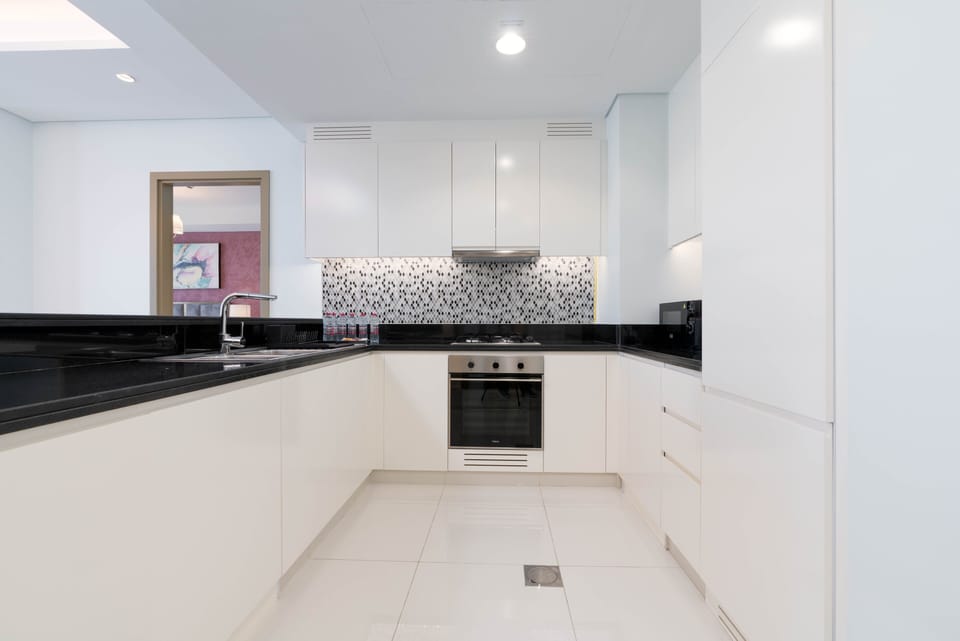 Panoramic Apartment | Private kitchen | Full-size fridge, microwave, oven, stovetop