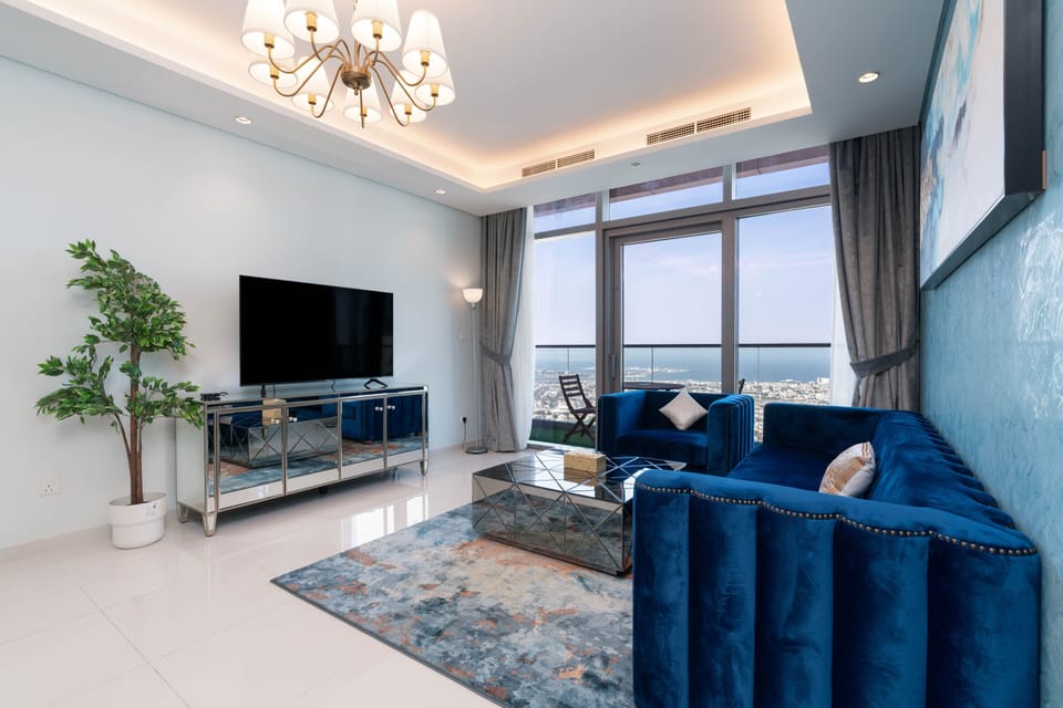 Panoramic Apartment | Living area | 60-inch Smart TV with digital channels, Netflix, streaming services
