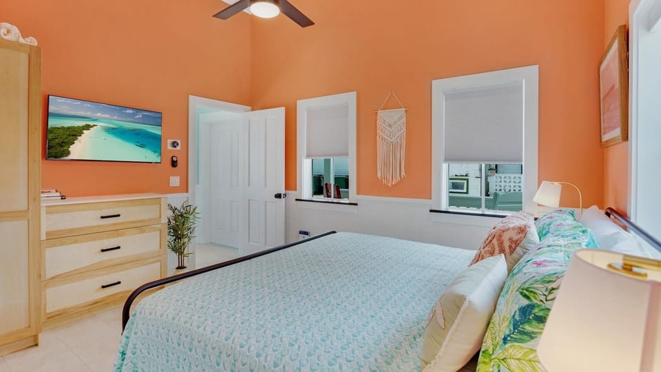 The Sunset Suite is located on the first floor with a king bed, and a flat-screen TV...