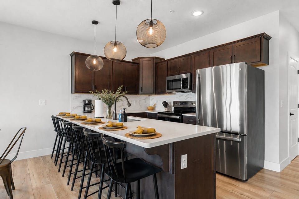 Fully Stocked Kitchen with plenty of island seating