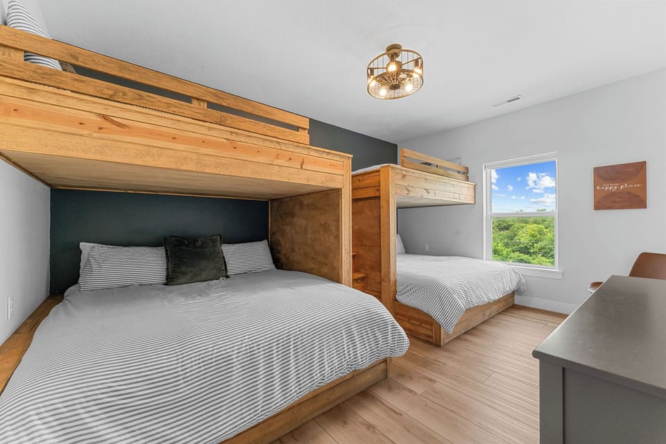 Custom Bunk Room with Two Full Over Kings and sleeps up to 8. The kids will have a blast! 