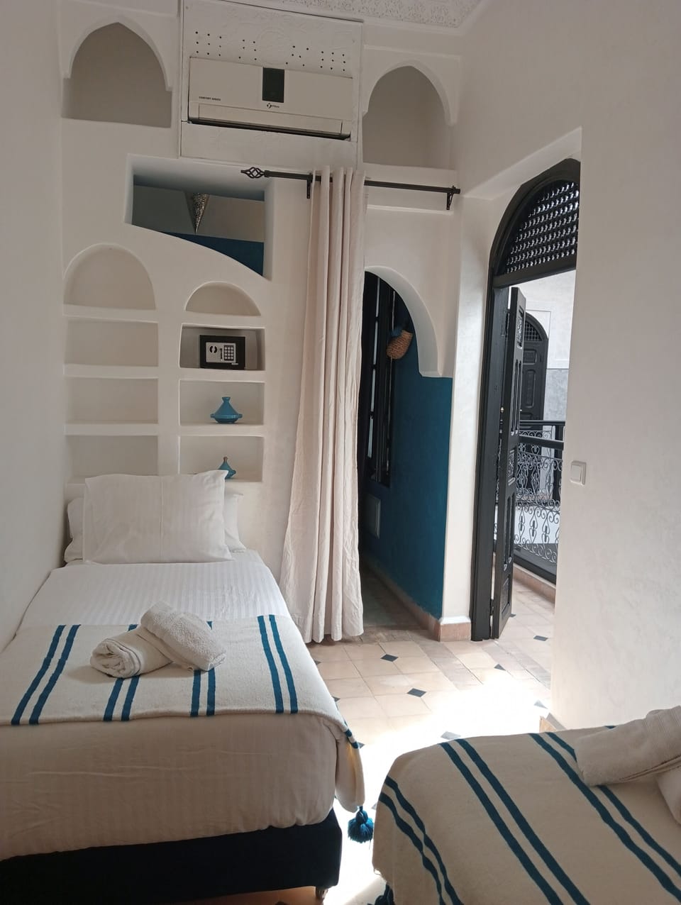 Comfort Room | Premium bedding, in-room safe, iron/ironing board, free WiFi