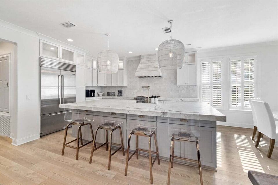 Sleek design meets functionality with room for guests to gather.