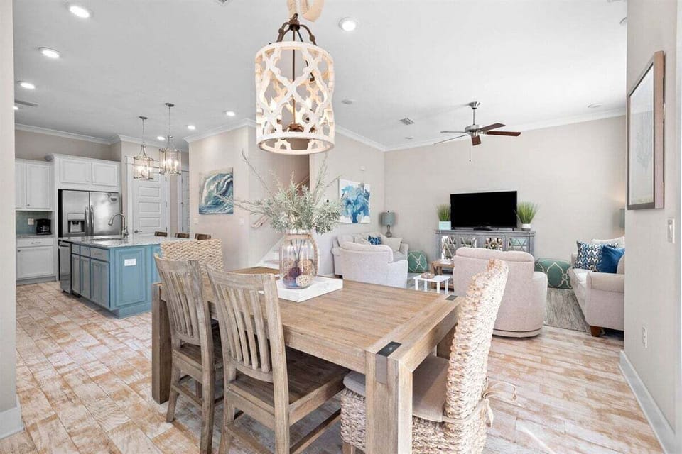 A seamless blend of living and dining spaces, creating a warm and inviting atmosphere.