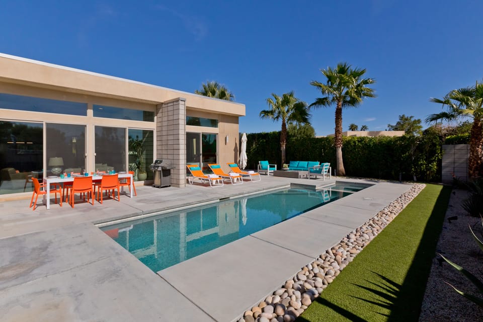  Pool in front of living room and primary bedroom sliders