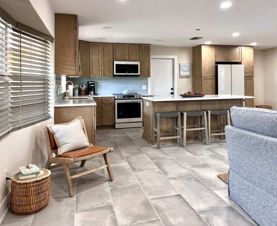 Entry: spacious open concept living room and kitchen