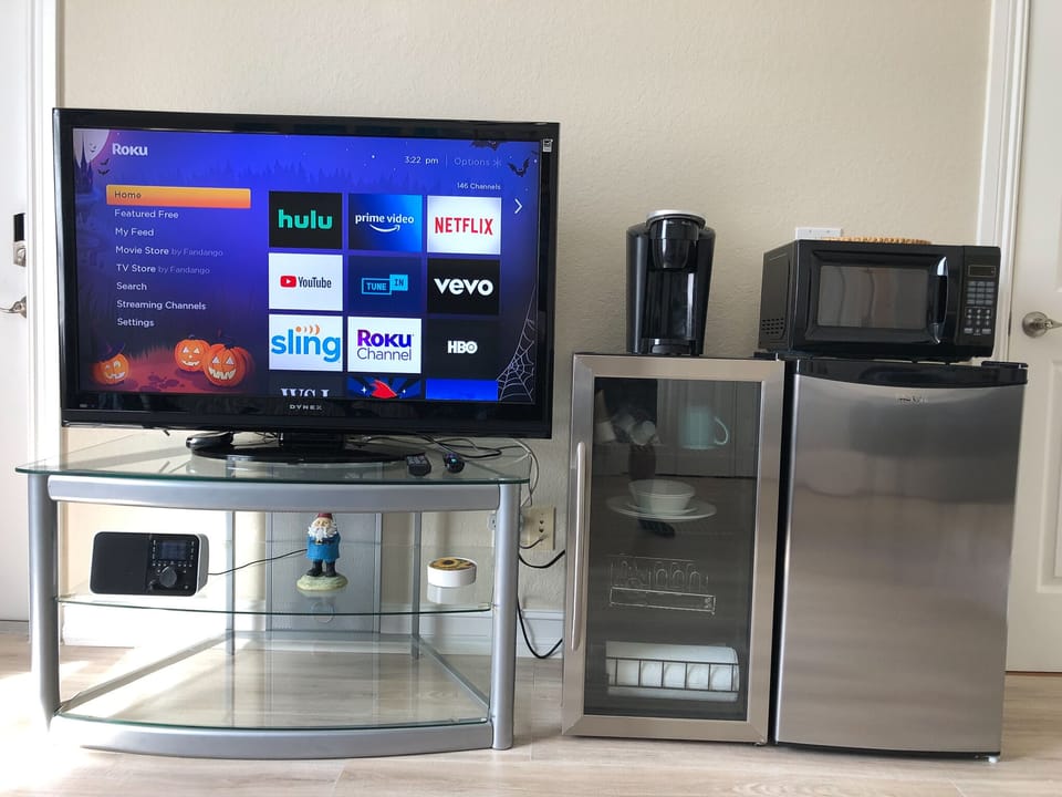 Basic Studio | Living area | 56-inch Smart TV with digital channels, Hulu, streaming services