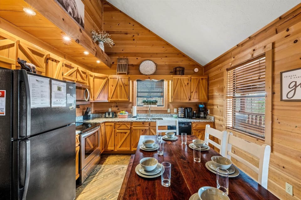Fully stocked kitchen and dining room with mountain views