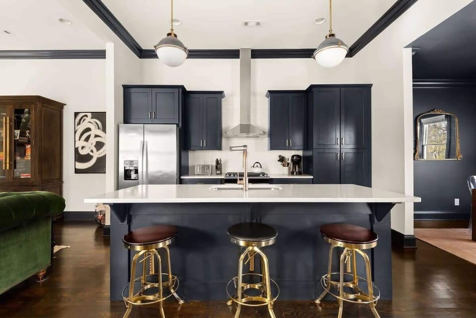 Quartz countertops, stools by Restoration Hardware