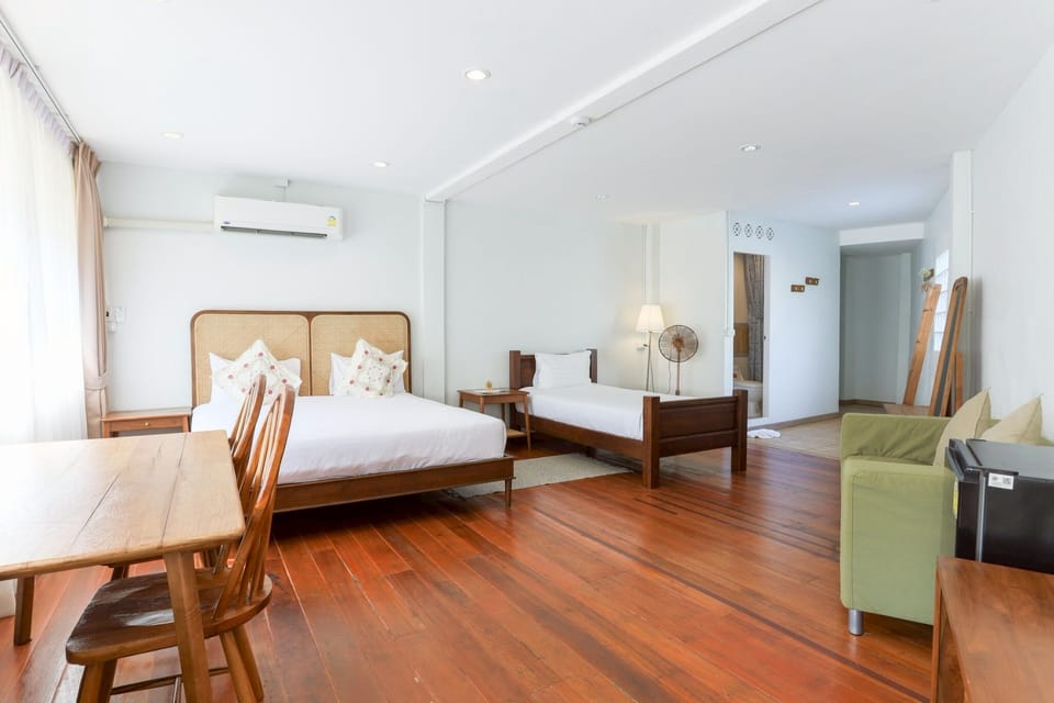 Premium Triple Room | In-room safe, desk, laptop workspace, free cribs/infant beds