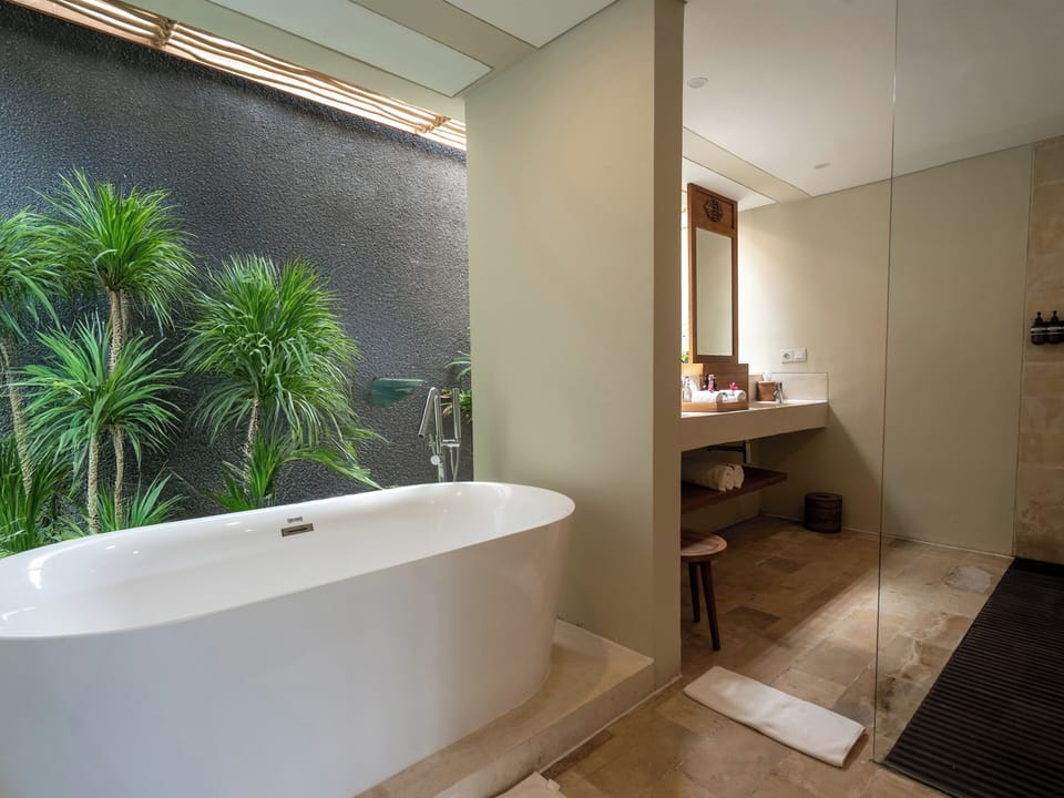 Shower, rainfall showerhead, designer toiletries, hair dryer