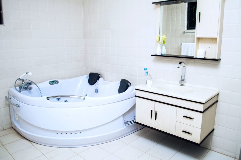 Shower, free toiletries, slippers, towels