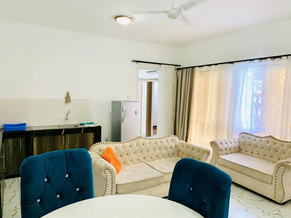 Business Apartment | Living area | 24-inch Smart TV with digital channels