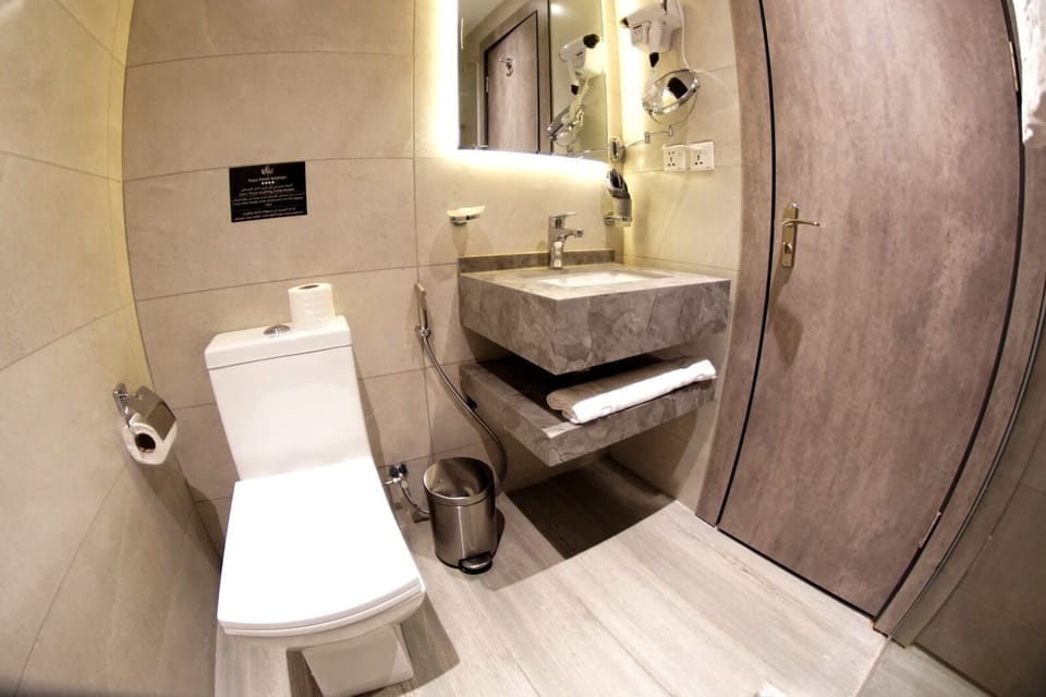 Shower, hydromassage showerhead, designer toiletries, hair dryer