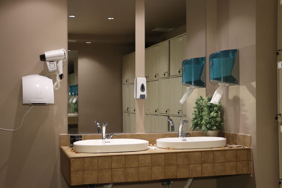 Superior Triple Room | Bathroom | Shower, hydromassage showerhead, designer toiletries, hair dryer