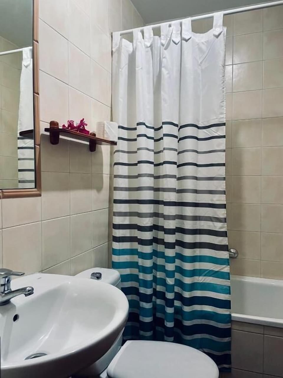 Shower, rainfall showerhead, hair dryer, towels
