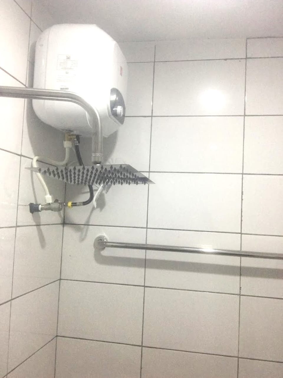 Rainfall showerhead, towels