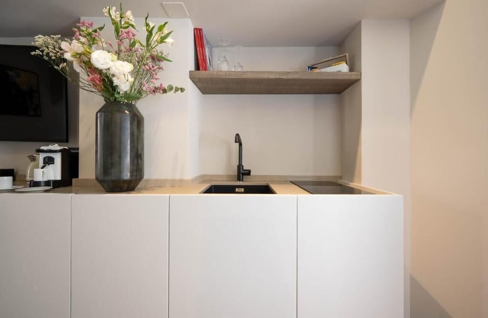 Executive Suite | Private kitchen | Mini-fridge, stovetop, espresso maker, electric kettle
