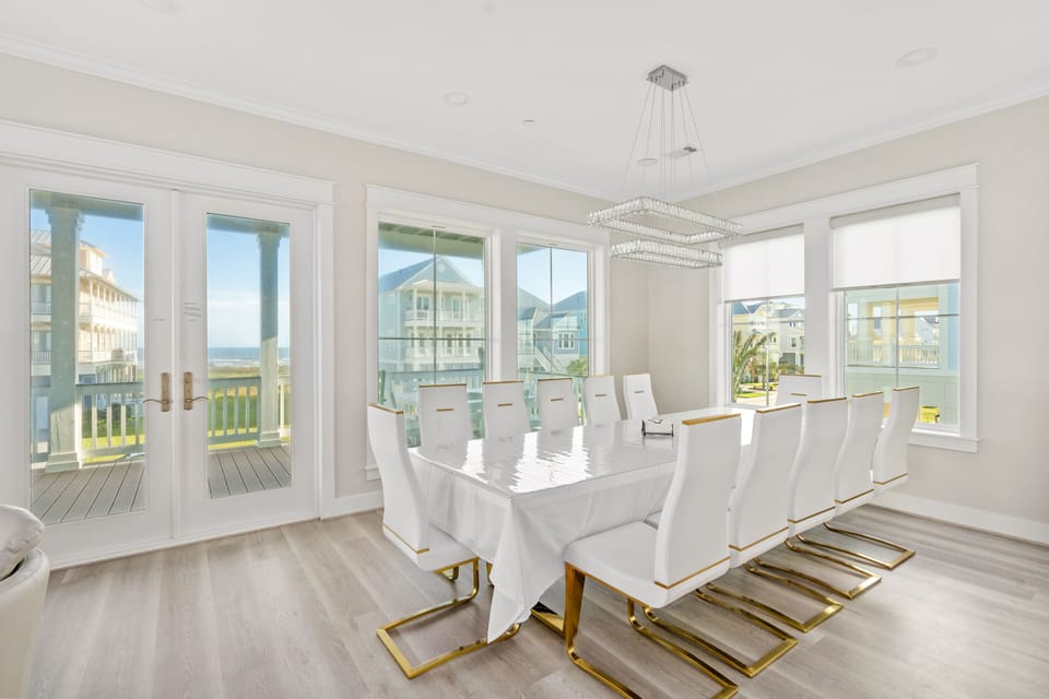 Dining room has table with 12 seats