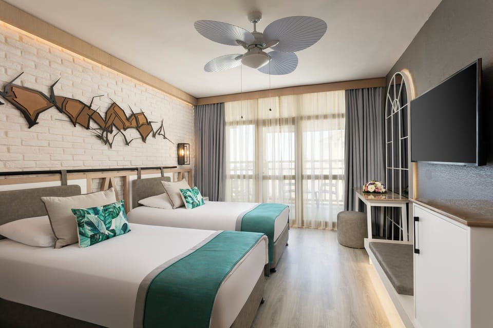 Free minibar, in-room safe, soundproofing, free cribs/infant beds