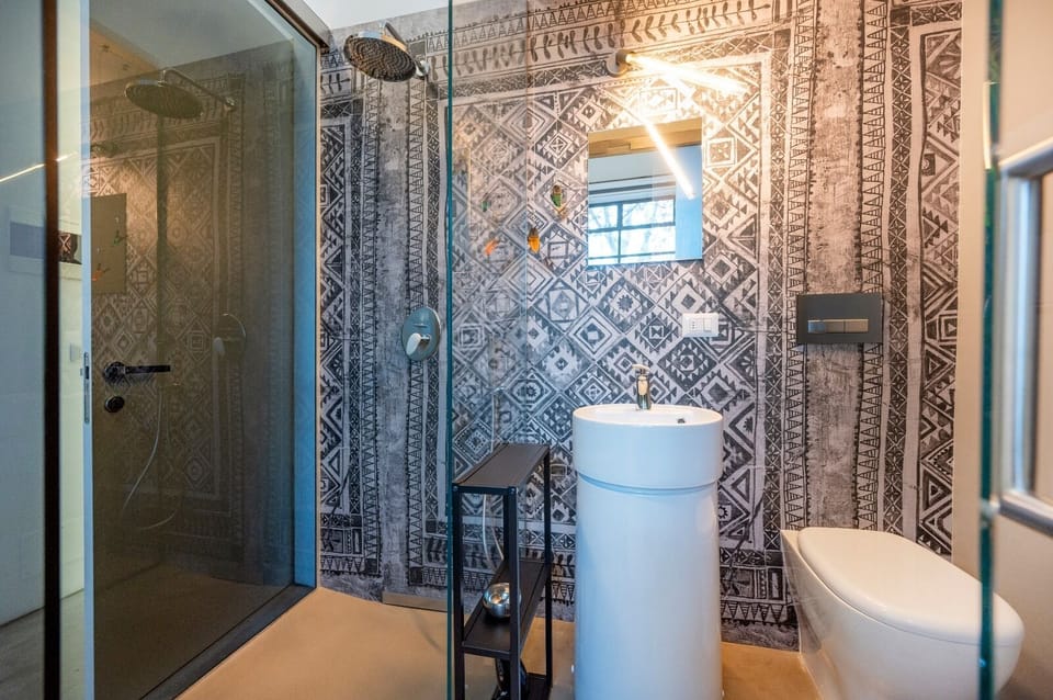 Luxury Double Room | Bathroom | Shower, rainfall showerhead, designer toiletries, hair dryer