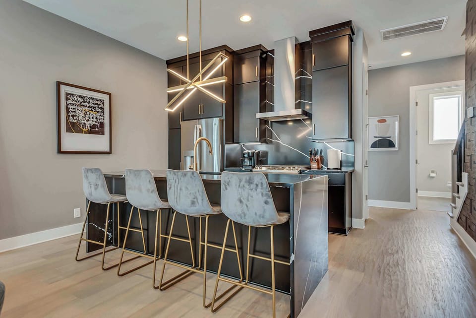 *Gorgeous kitchen with waterfall countertop detail.