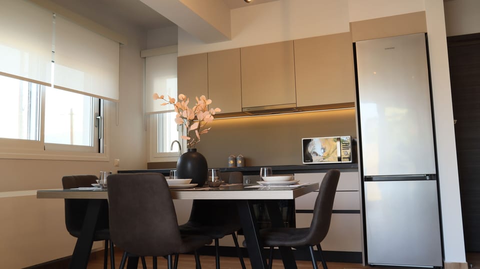 Panoramic Apartment (Avra) | Private kitchen | Full-size fridge, microwave, oven, stovetop