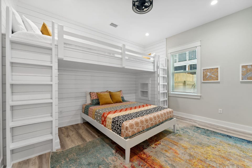 Bedroom 1: Queen bed + 2 twins