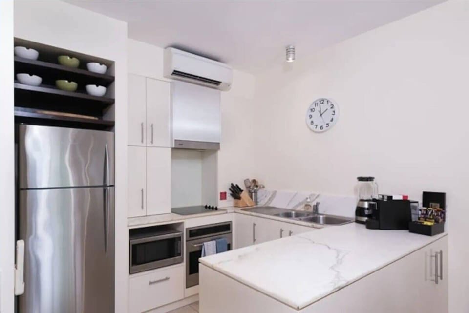 The kitchen comes well-equipped to prepare meals at home, or you may reserve your seats at the onsite restaurant. 