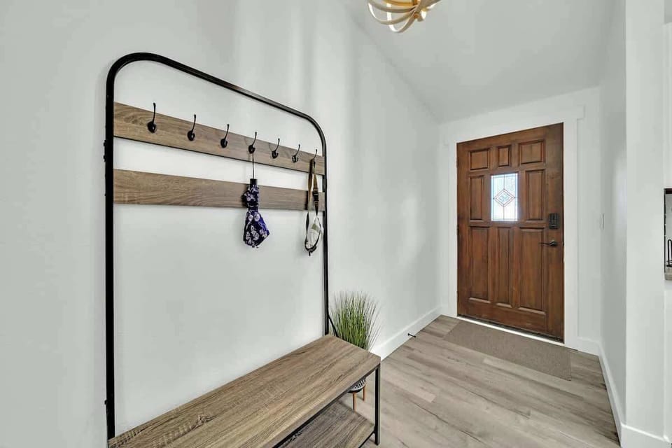A very handy set of hangers and a bench are just inside the front door. Hang up your coat, take off your shoes, and settle in for your relaxing stay with us!