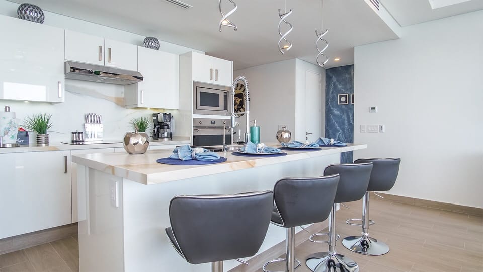 Great kitchen island, raised upholstered seats.