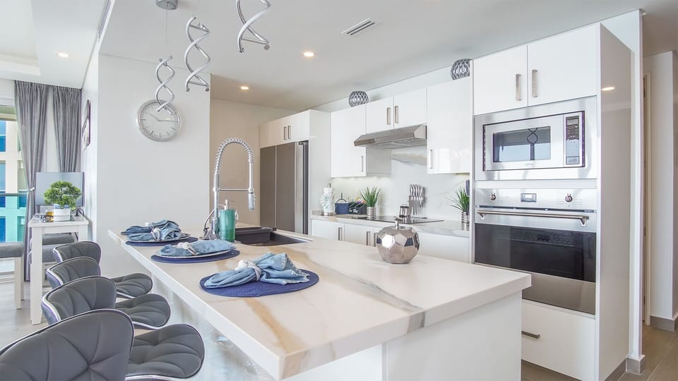 The kitchen has everything you need for any length of stay. The island makes an extra place to share an informal meal.