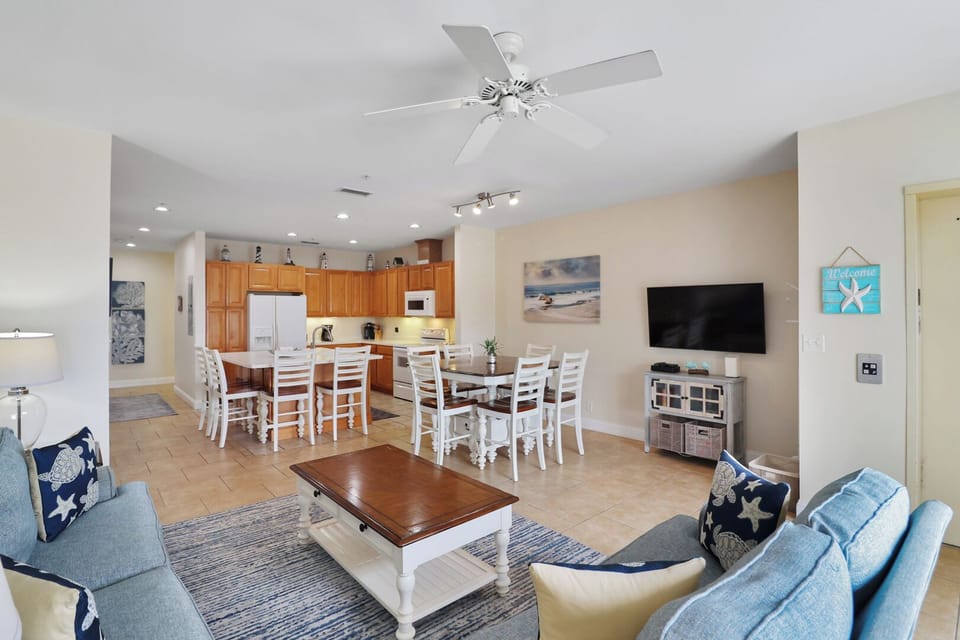 Open floor concept showing the living area, dining room, and kitchen