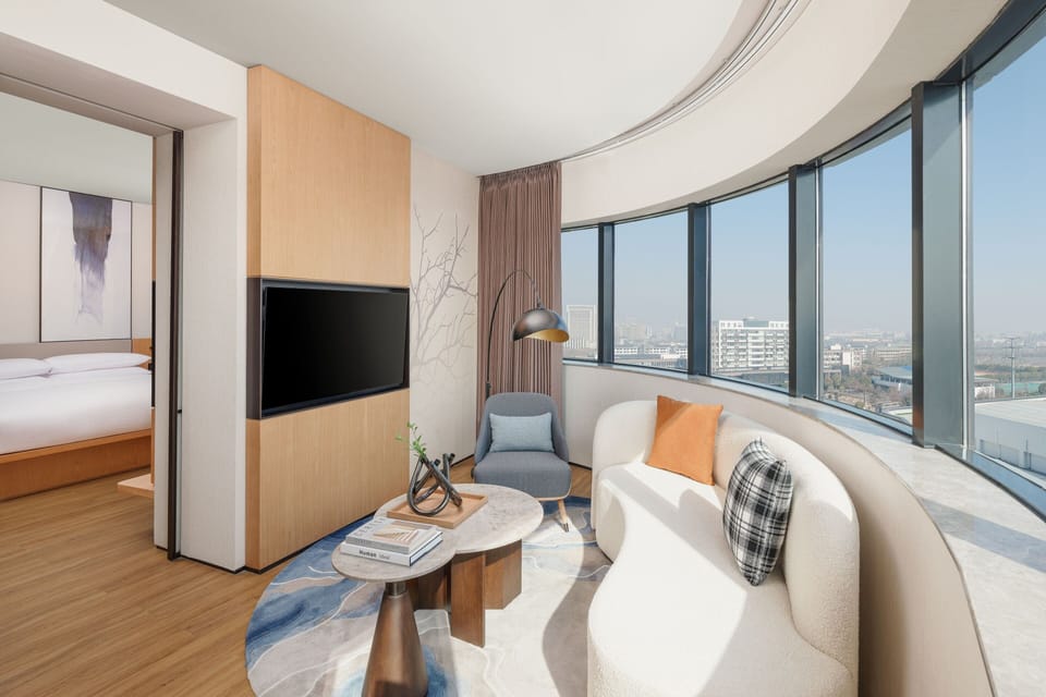 Suite, 1 King Bed | Down comforters, blackout drapes, iron/ironing board, free WiFi