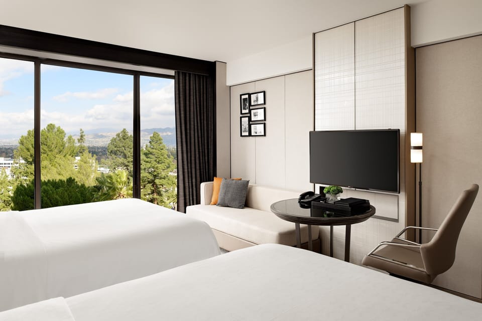 Premium bedding, down comforters, in-room safe, desk