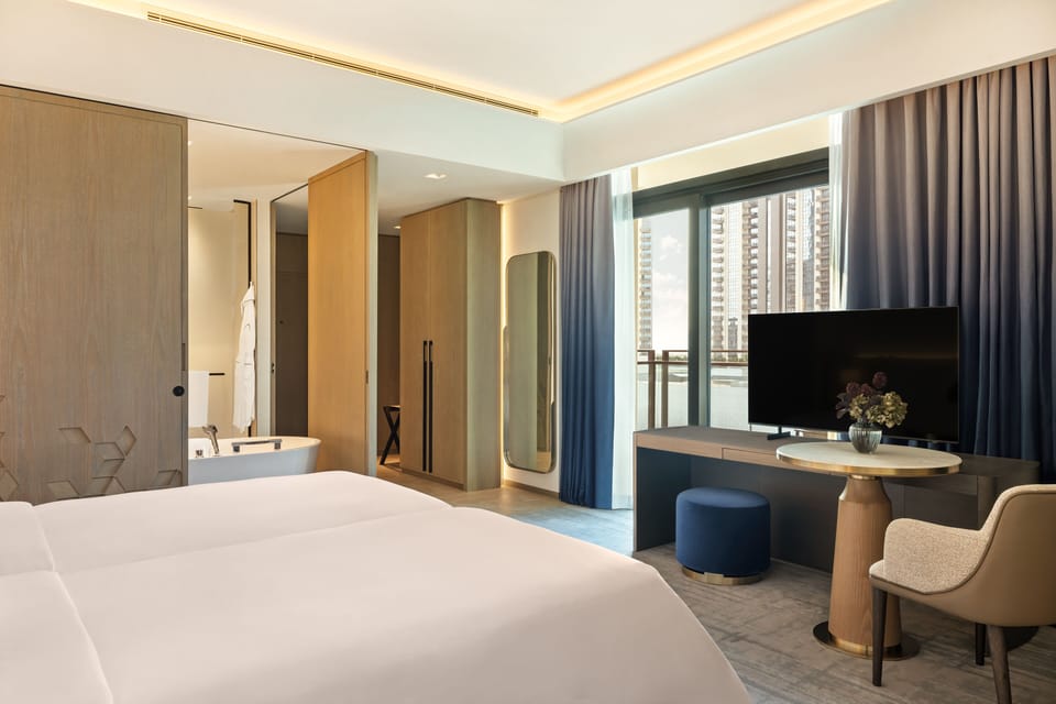 Deluxe Twin Room, 2 Twin Beds - Complimentary Lagoon Access | Living area | 52-inch LCD TV with digital channels, pay movies